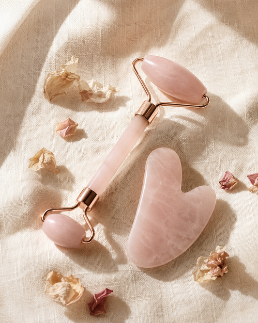 FluidCrystal Rose Quartz Ritual Set - roller and gua sha on linen